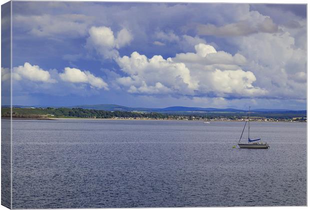  Clouds above Moray Firth Canvas Print by Derek Corner