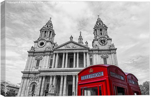  Red Phone boxes in front of black and white St Pa Canvas Print by Philip Pound