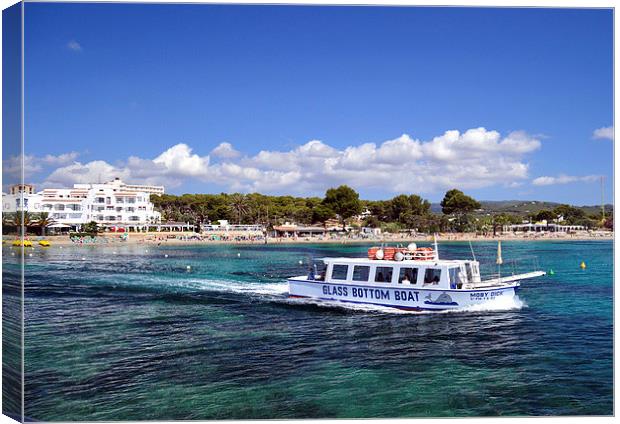  Glass Bottom Boat Heading out of Es Cana bay, Ibi Canvas Print by Mick Surphlis