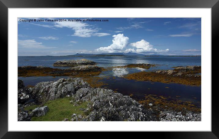  Isles of Eigg and Rum from Arisaig. Framed Mounted Print by John Cameron