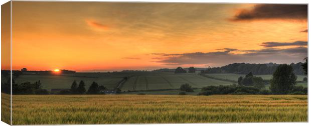 Sunset over the fields Canvas Print by James Battersby