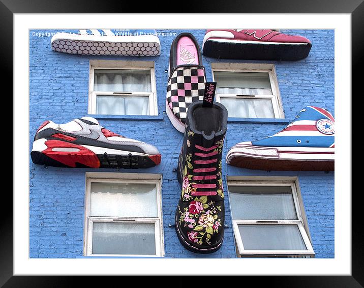  Boots and Trainers on a Blue Wall Framed Mounted Print by Philip Pound