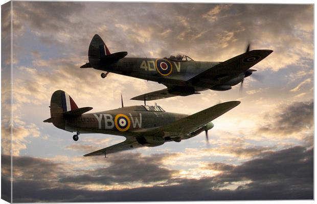  Spitfire and Hurricane Canvas Print by J Biggadike