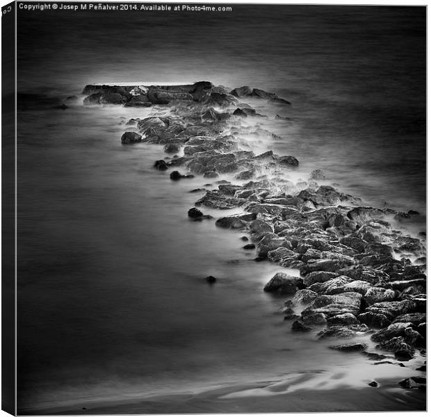 Breakwater on beach Canvas Print by Josep M Peñalver