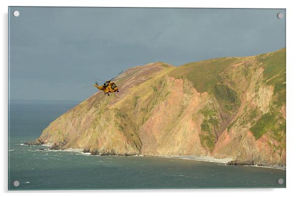 Rescue Helicopter over Lynmouth Bay  Acrylic by graham young