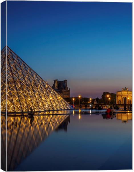 Louvre Pyramid Sunset Canvas Print by Mark Llewellyn