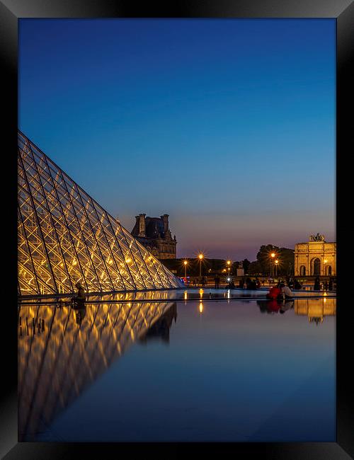 Louvre Pyramid Sunset Framed Print by Mark Llewellyn