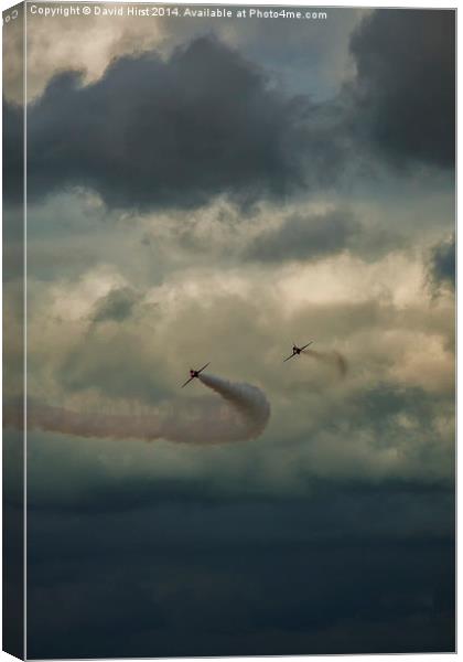  Red arrows with brooding skies Canvas Print by David Hirst