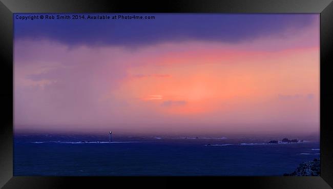  Approaching Storm over Hanois Lighthouse at sunse Framed Print by Rob Smith