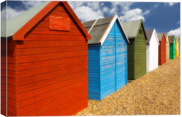   Multi-coloured beach Huts Canvas Print by David Hare