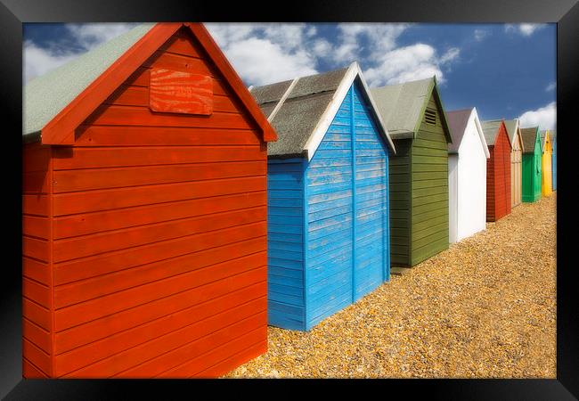   Multi-coloured beach Huts Framed Print by David Hare