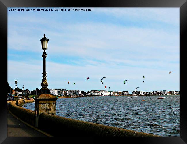 Kite Surfing at Poole Harbour. Framed Print by Jason Williams