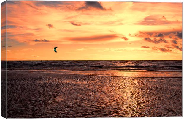  Kitesurfing At The Sunset Canvas Print by Roger Green