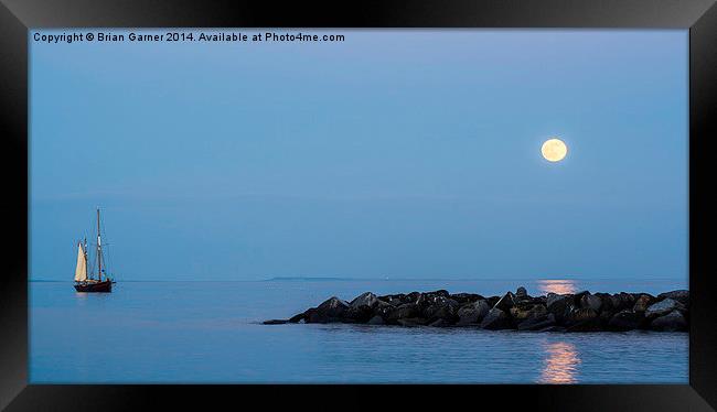  Moons Rise Over the Sea at Lyme Regis Framed Print by Brian Garner