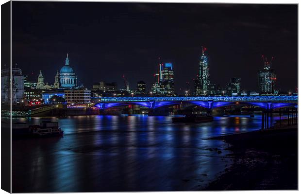 Viewing City of London across River Thames  Canvas Print by Errord Jarrett