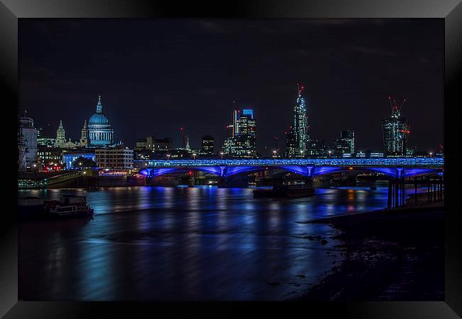 Viewing City of London across River Thames  Framed Print by Errord Jarrett