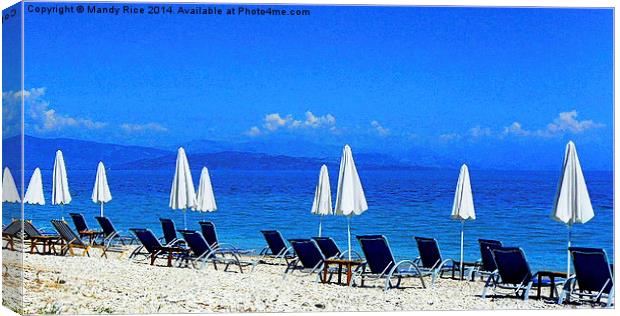 Beach chairs and parasols Canvas Print by Mandy Rice