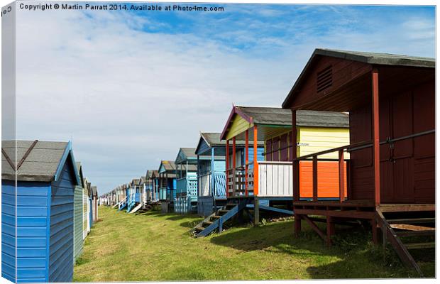 Whitstable Beach Huts Canvas Print by Martin Parratt
