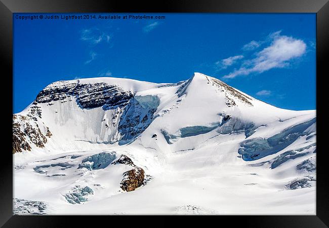 Snowy Mountain Peaks Canada  Framed Print by Judith Lightfoot