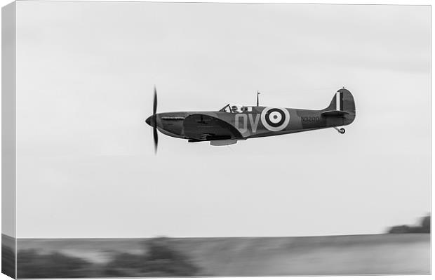 Spitfire low-level flying black and white version Canvas Print by Gary Eason