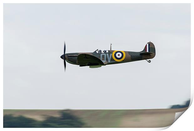 Spitfire low-level flying Print by Gary Eason