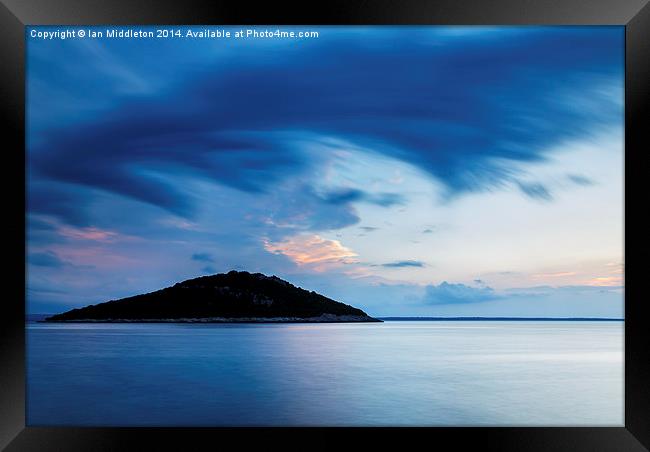 Storm moving in over Veli Osir Island at sunrise Framed Print by Ian Middleton