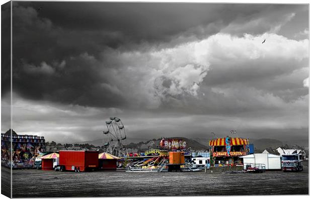  Funfair on a stormy day in Llandudno Canvas Print by Mal Bray