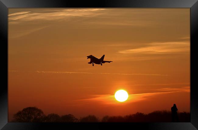  A Typhoon lands at sunset Framed Print by Philip Catleugh