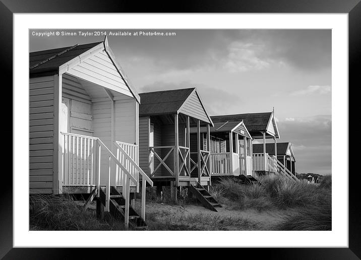 Old Hunstanton beach huts  Framed Mounted Print by Simon Taylor