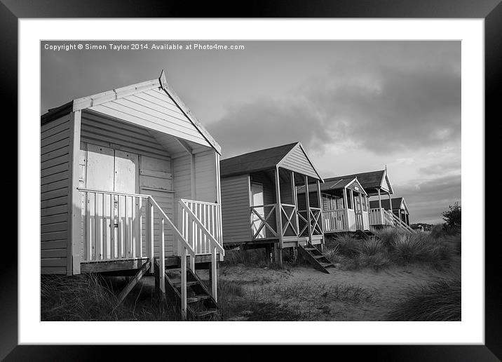 Old Hunstanton Beach huts  Framed Mounted Print by Simon Taylor