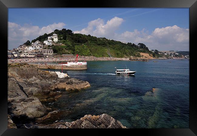  A boats heads out to sea at Looe Framed Print by Rosie Spooner