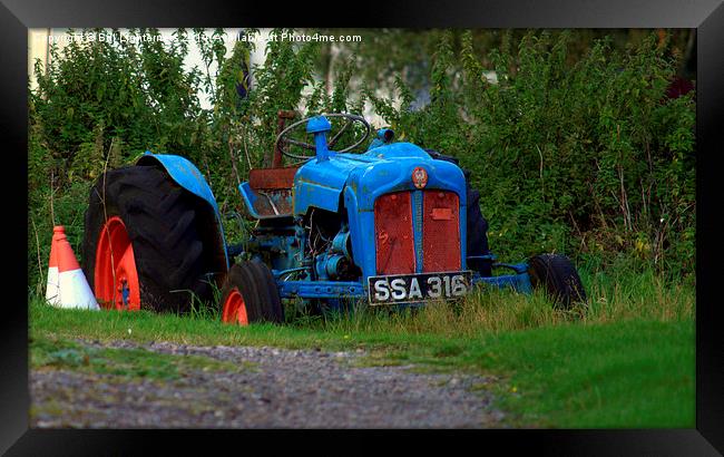  The Blue Tractor Framed Print by Bill Lighterness