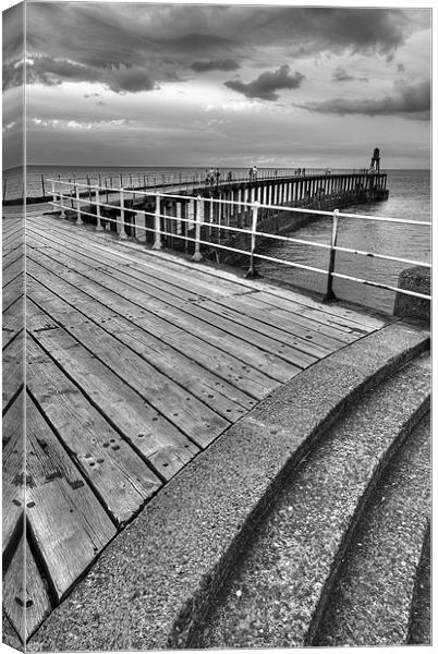 Whitby Pier, North Yorkshire Canvas Print by Martin Williams