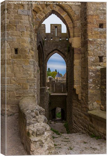  A View Through an Arch at Carcassone Canvas Print by colin chalkley