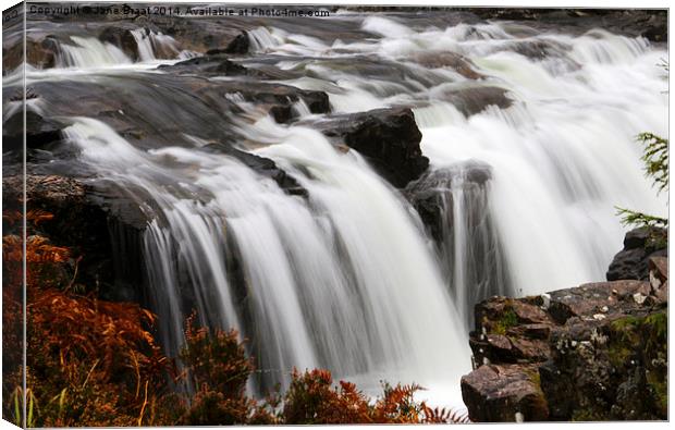  Powerful waterfall in Glen Coe Canvas Print by Jane Braat