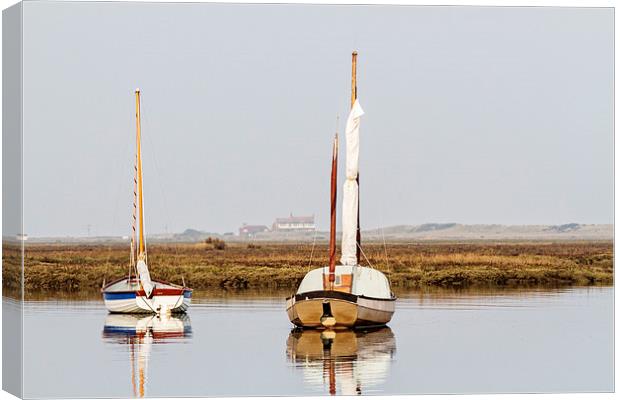 Reflections at Brancaster Staithe Canvas Print by Paul Macro