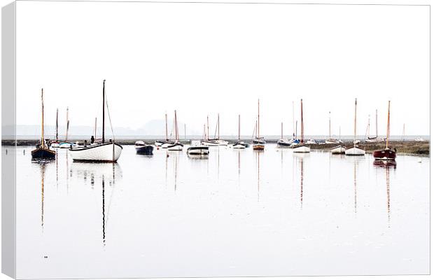  Burnham Overy Boat Reflections Canvas Print by Paul Macro