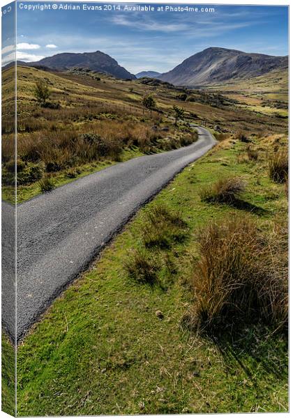 Winding Road to llyn Cowlyd Reservoir Canvas Print by Adrian Evans