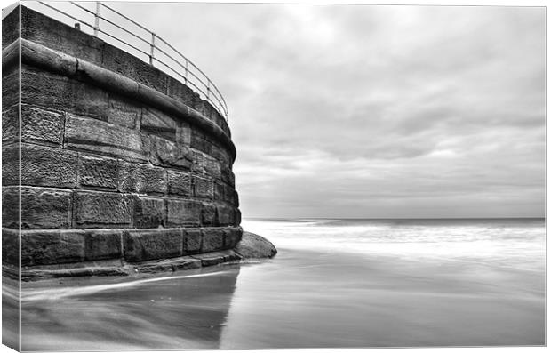 Whitby, Sea Wall Canvas Print by Martin Williams