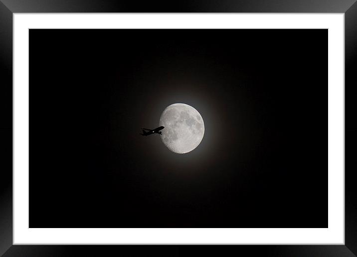 Airliner passing in front of the Moon Framed Mounted Print by Gary Eason