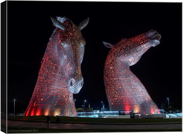 The Enchanting RedLit Kelpies Canvas Print by Tommy Dickson