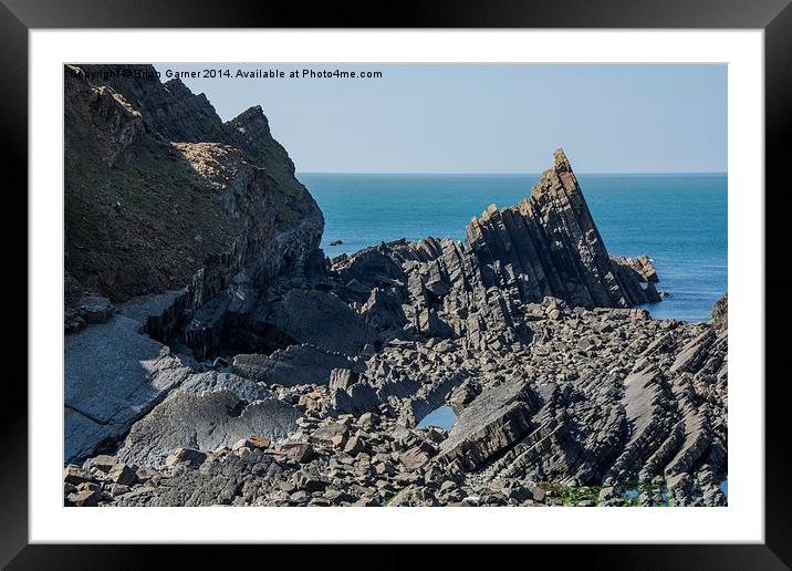  Layered Rocks off the Hartland Peninsula Framed Mounted Print by Brian Garner
