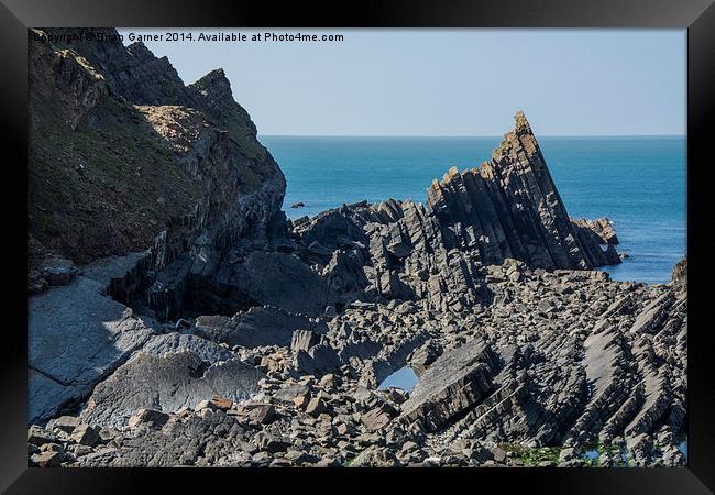  Layered Rocks off the Hartland Peninsula Framed Print by Brian Garner