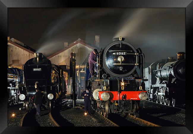  Steam locomotives receive attention on shed at ni Framed Print by Ian Duffield