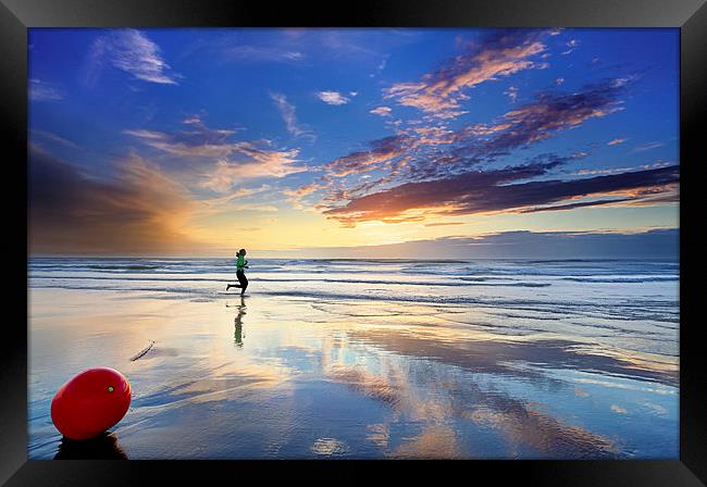 Jogging At Sunset Framed Print by Reza Sina