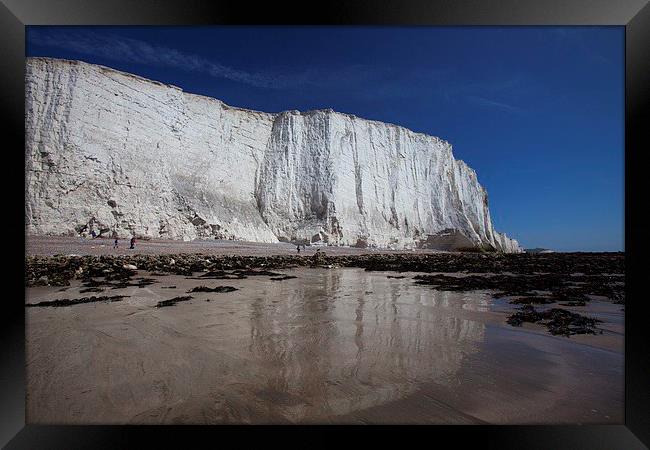  Chalk cliffs rising above the beach Framed Print by Stephen Prosser