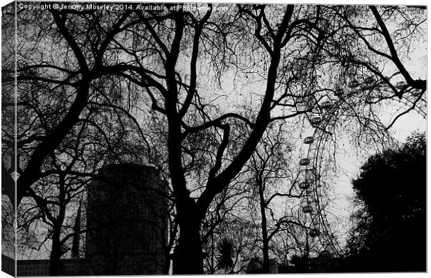 London Eye seen through branches Canvas Print by Jeremy Moseley