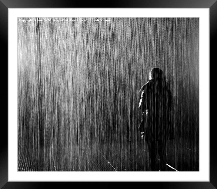 Lone figure standing in the rain Framed Mounted Print by Jeremy Moseley