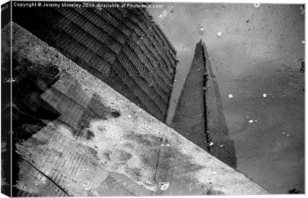  The Shard as seen in a puddle Canvas Print by Jeremy Moseley