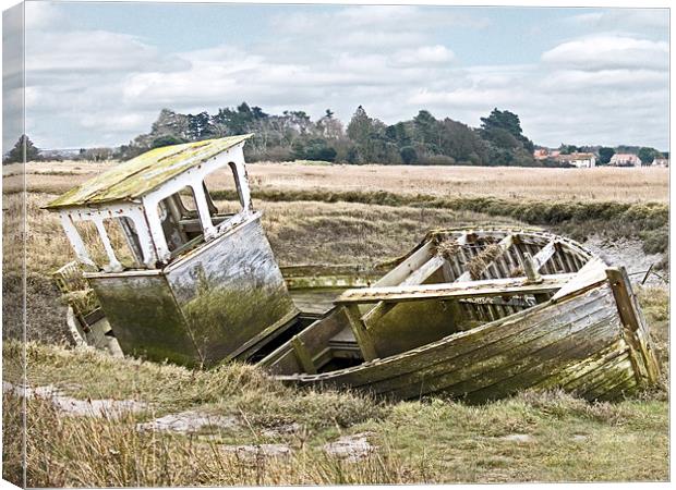 Old Boat in the field at Thornham North Norfolk  Canvas Print by john hartley